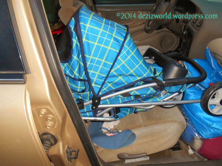 Lot's of yous hav asked how da stwoller goes in da caw, so weez fawt we wuld show yous a foto of us in da caw, but it's a shot of da stwoller and not us. (we be in there tho')