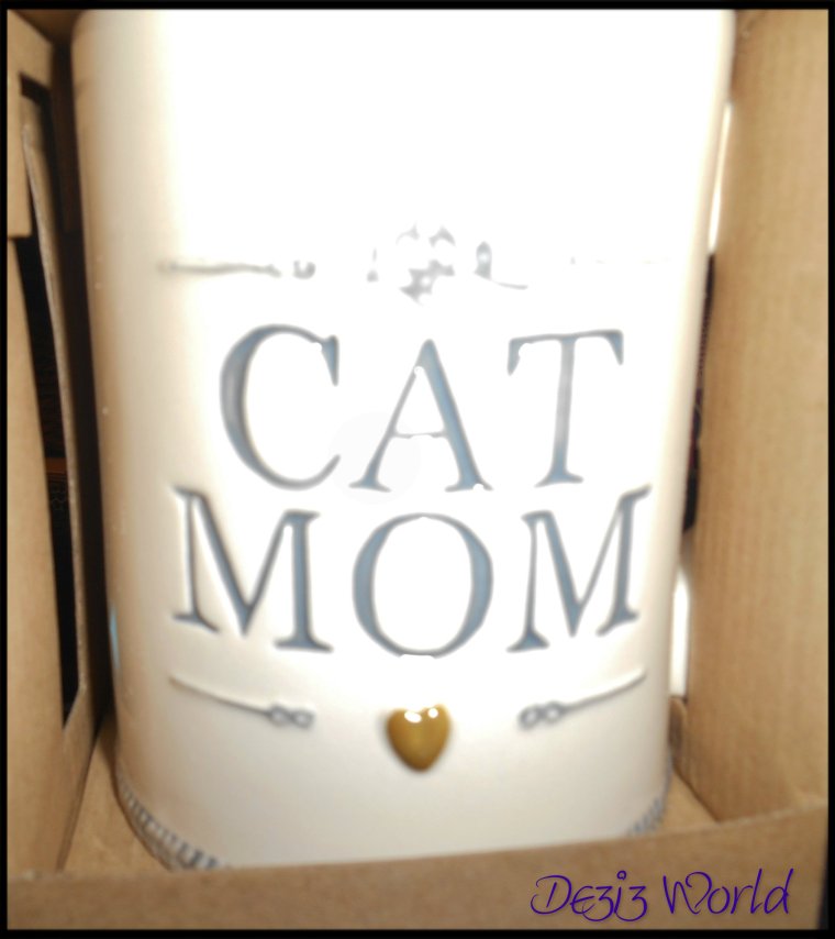 Isn't mommys new coffee cup cute? It sez it all purrfectly. 