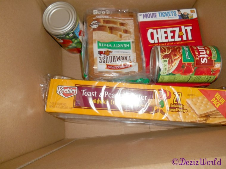 Gift box with cheez-it, bread, pb crakers, and pasta sauce