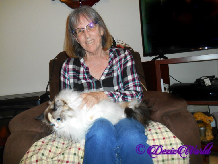 Raena lays in Ava's lap