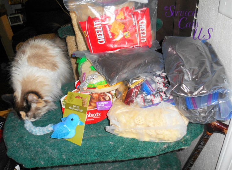 Raena checks out gifts from Cynthia